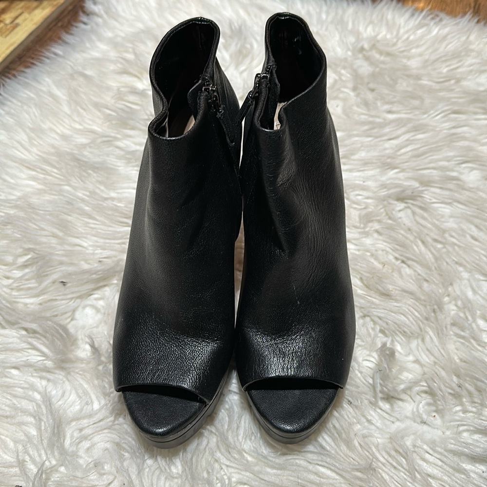 Black leather platform bootie.  Size 9. 6-in heel.
